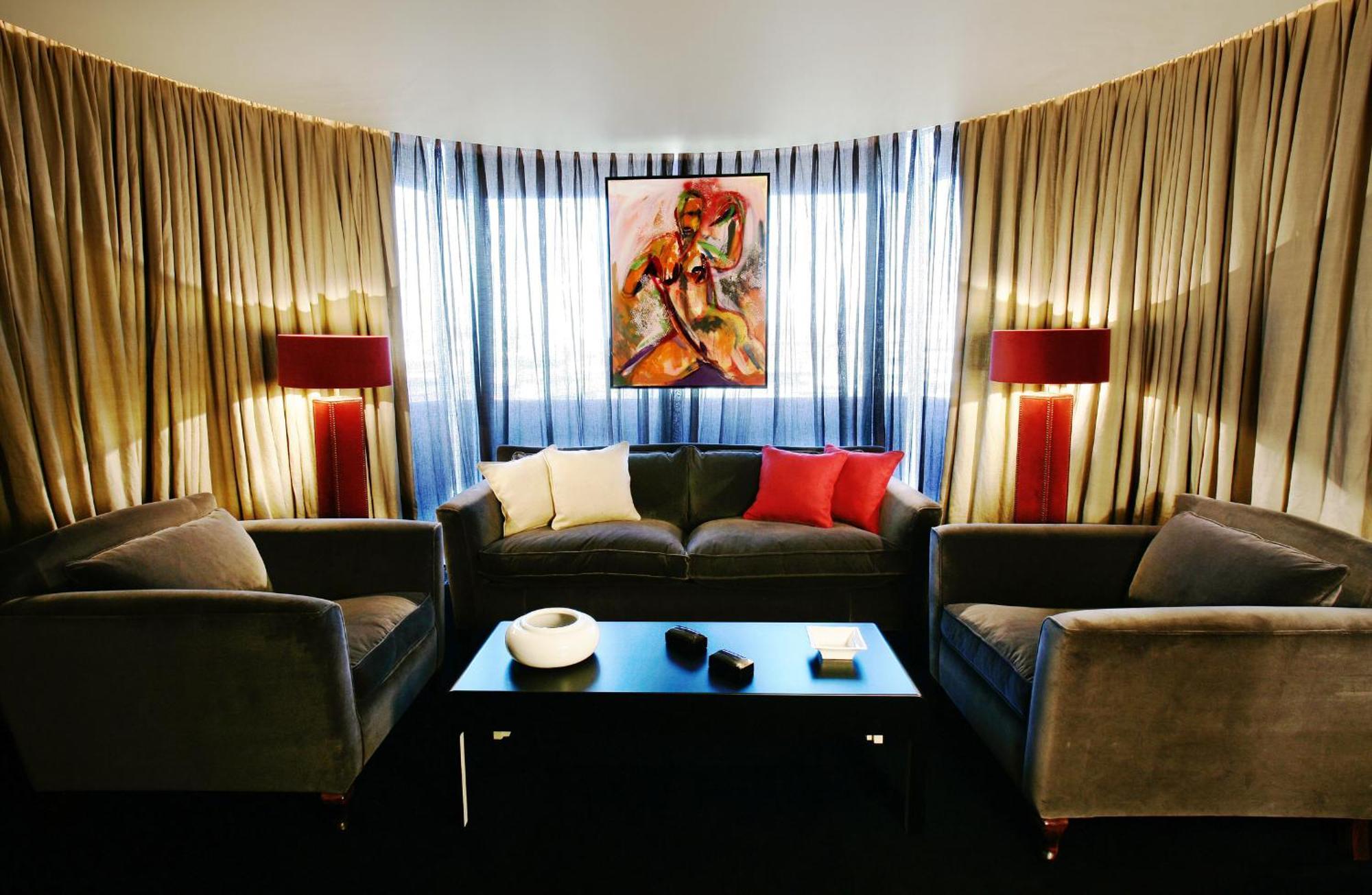 Hotel Puerta America Madrid Exterior foto A living room